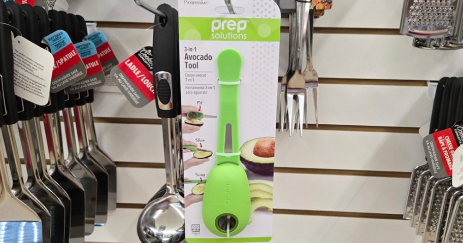 green avocado prep tool hanging in store