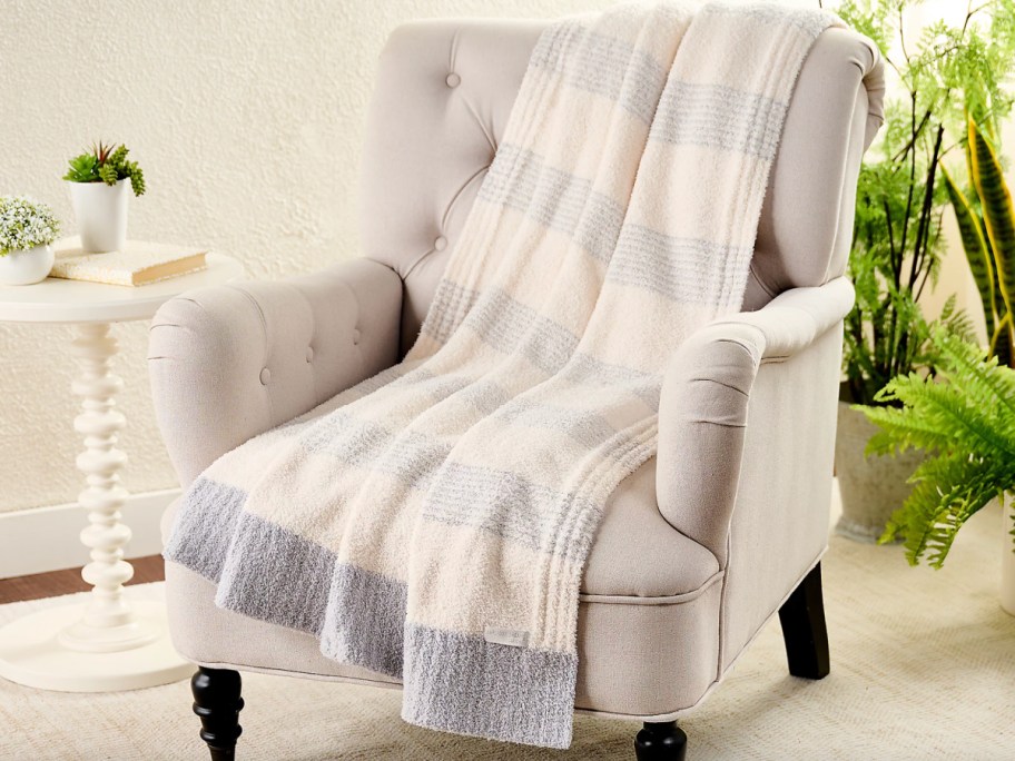 barefoot dreams blanket on chair 