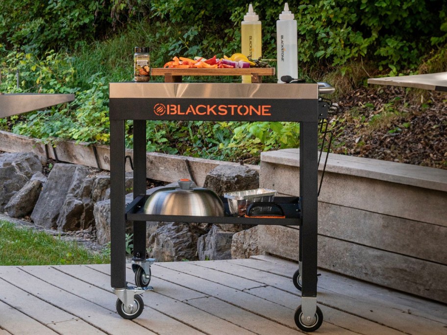 blackstone cart with steel top with food on top on patio 