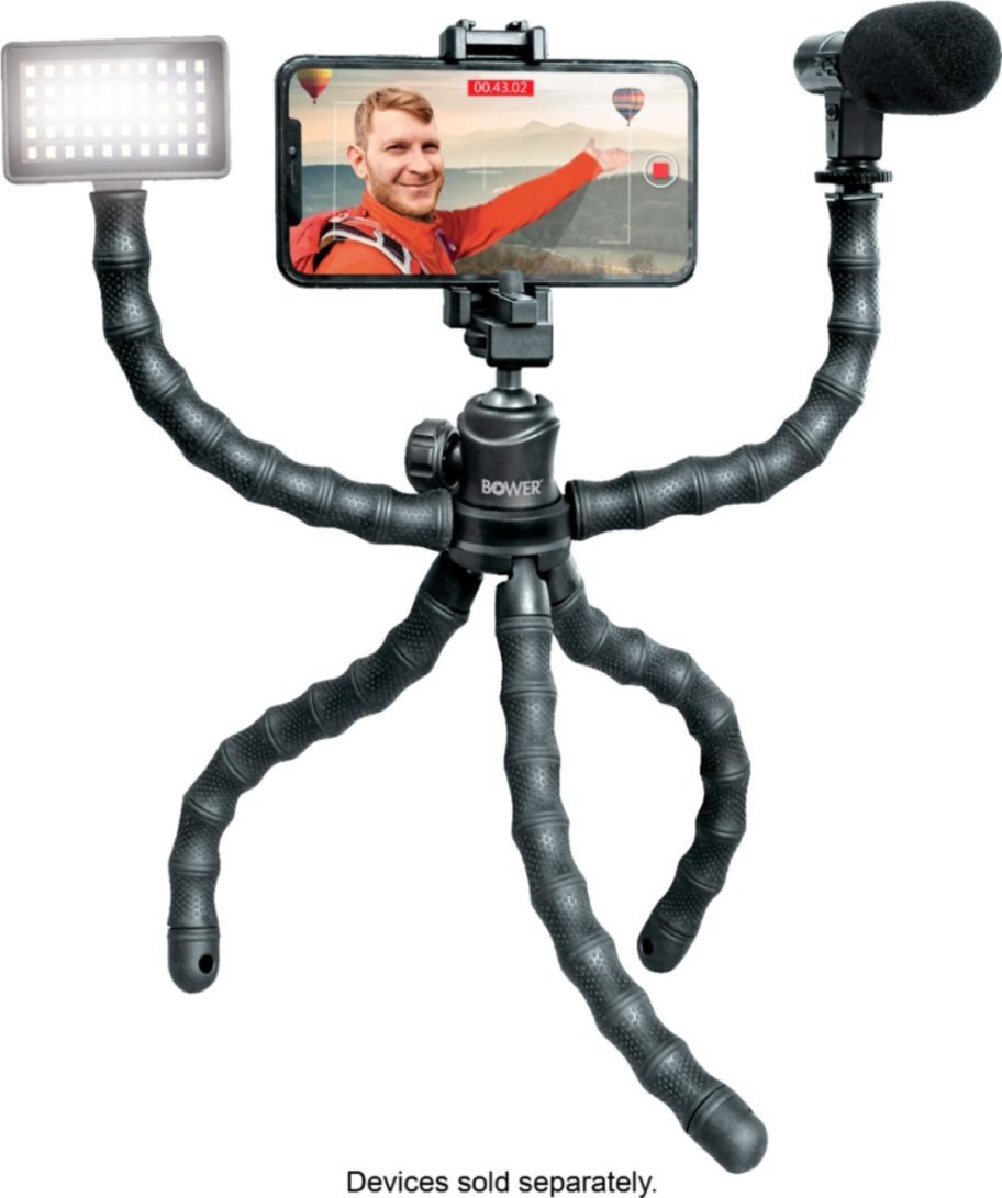 flexible tripod holding phone, light, and microphone