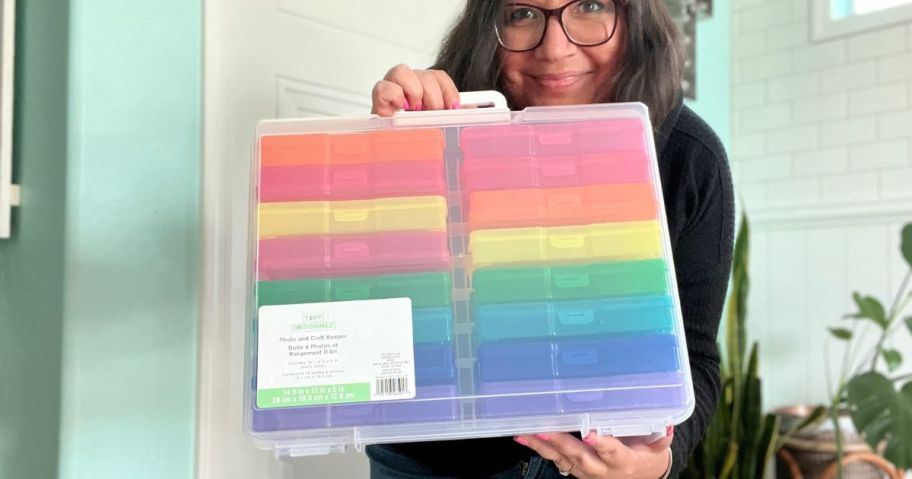 woman holding rainbow Simply Tidy 16-Case Photo and Craft Keeper