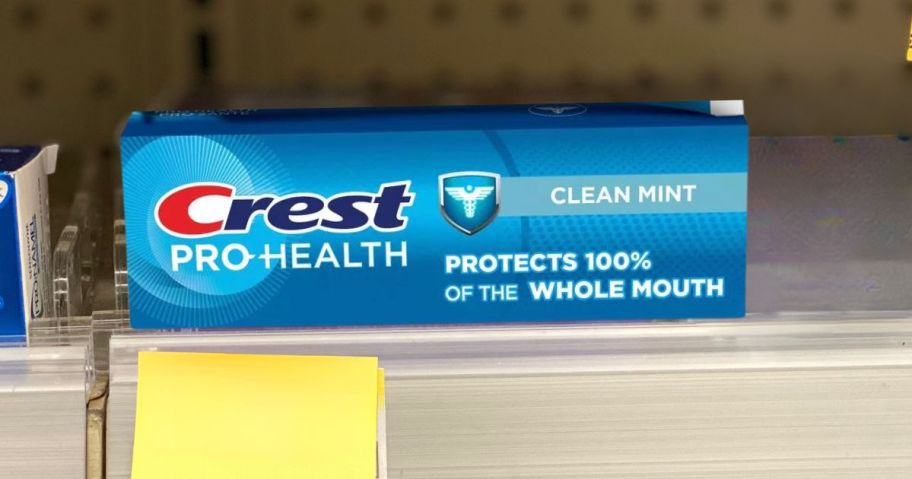 crest toothpaste on shelf in store