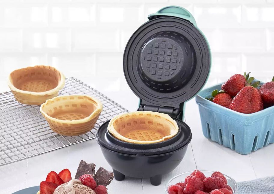 dash waffle bowl maker on a kitchen counter