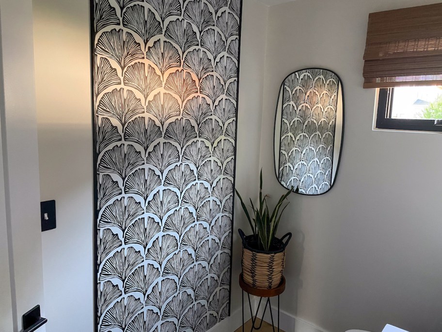 black and white floral wallpaper art on bathroom wall