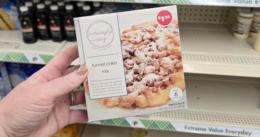 hand holding box of funnel cake mix 