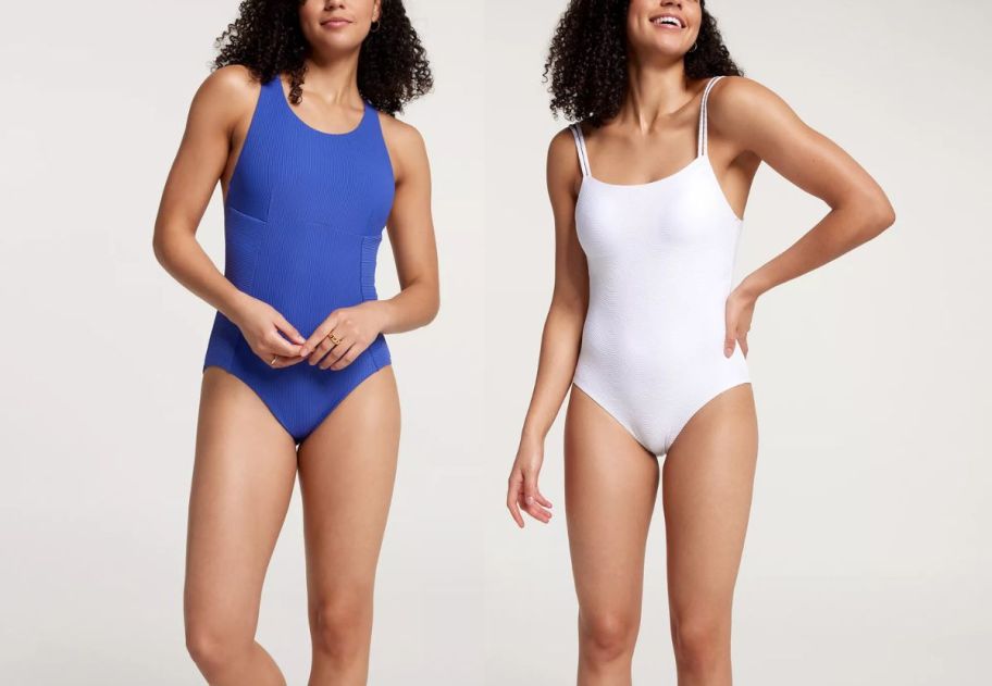 two models wearing one piece swim suits