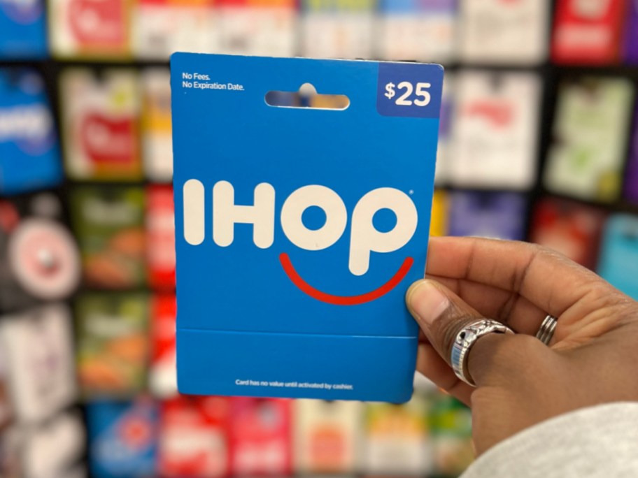 hand holding IHOP gift card