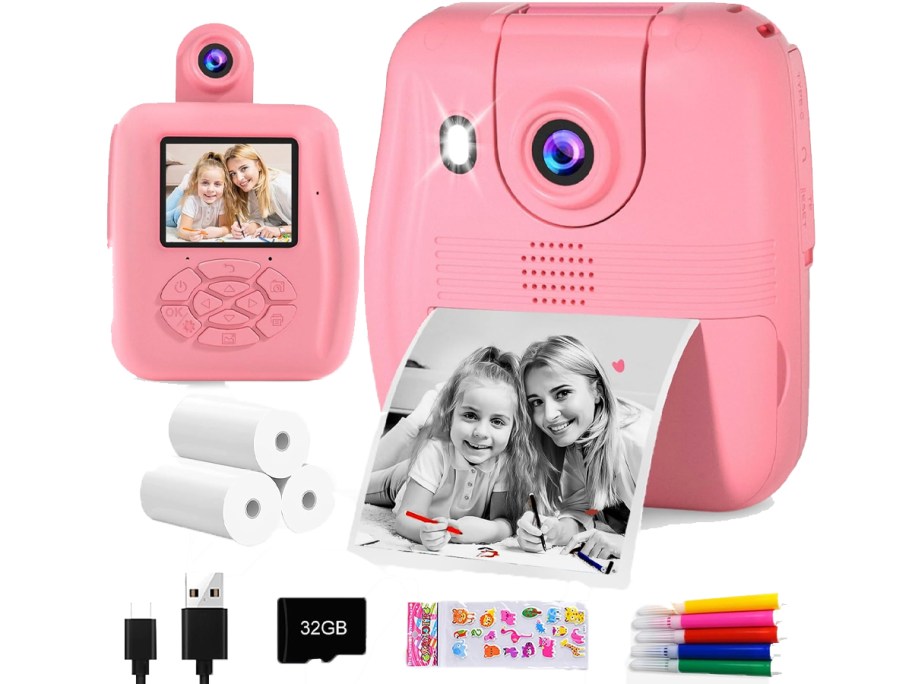 pink instant print camera with accessories 