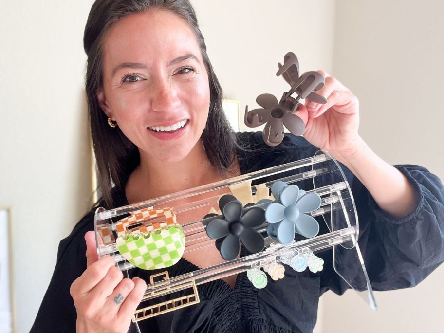 a woman with a rotating claw clip organizer