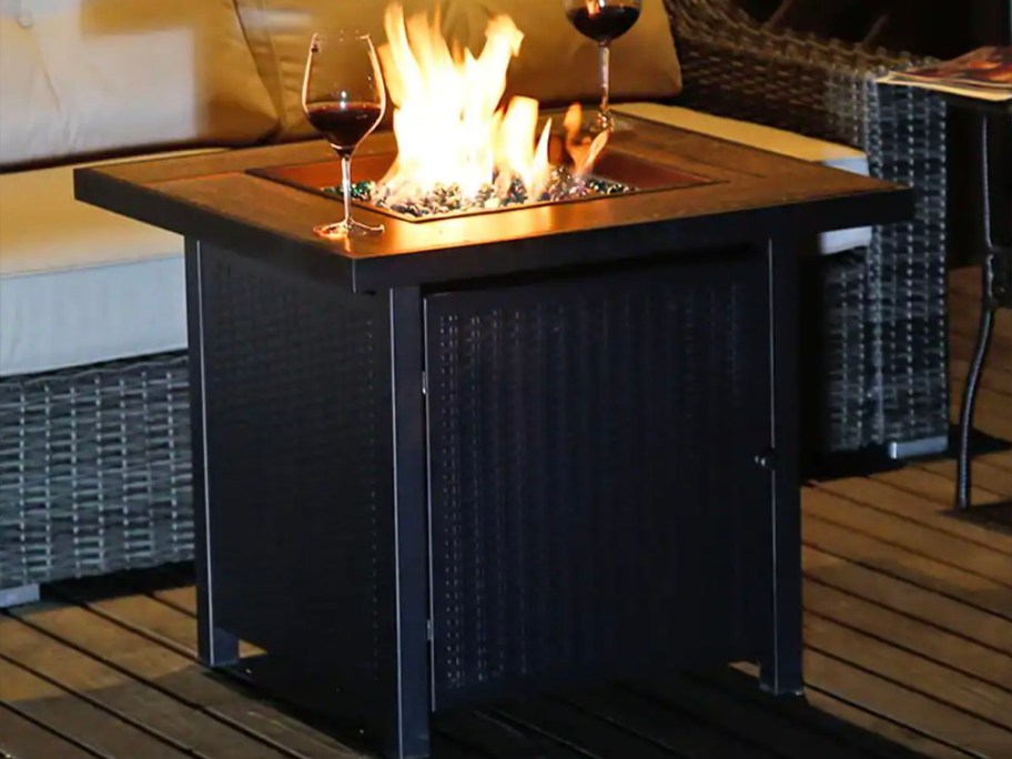 black firepit with fire 
