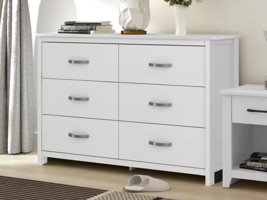 white 6 drawer dresser in a bedroom