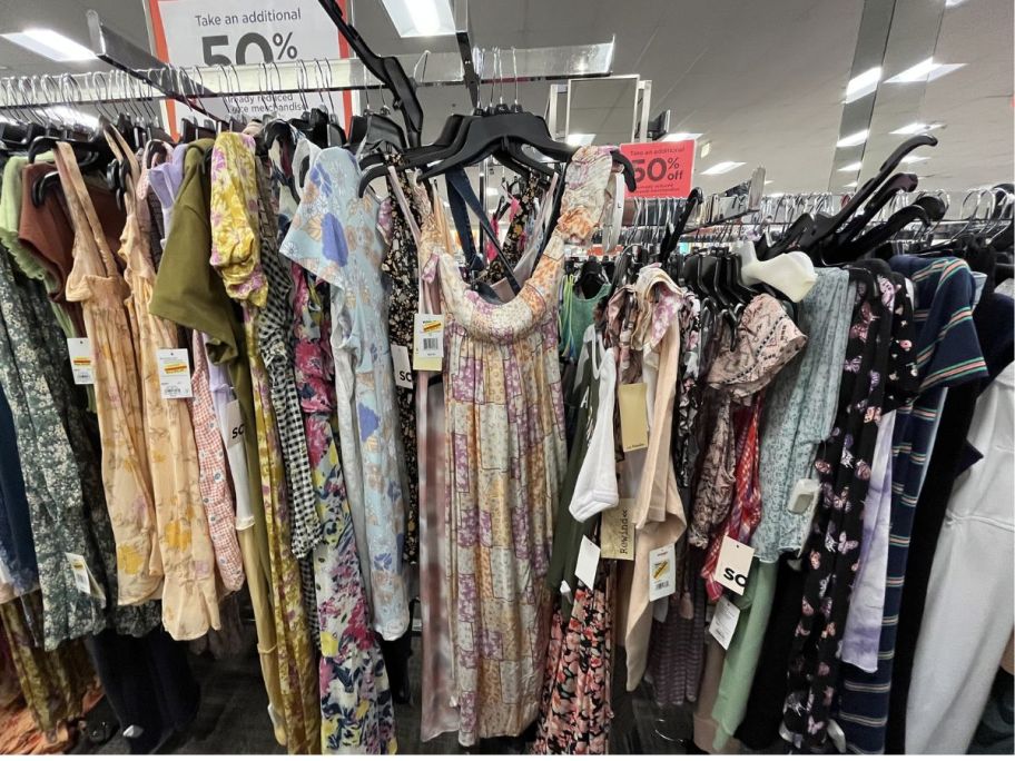 a rack of womens clearance dresses in a kohls store