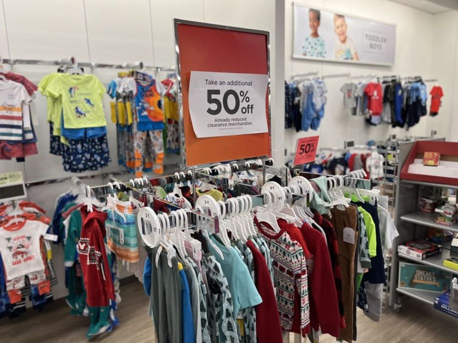kids clearance clothes on rack in a kohls store