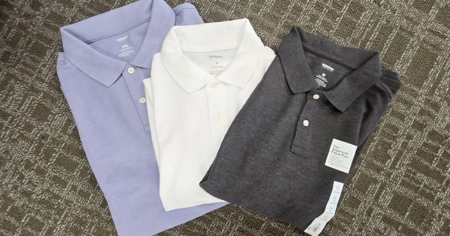 blue, white and gray polo shirts laying on carpet