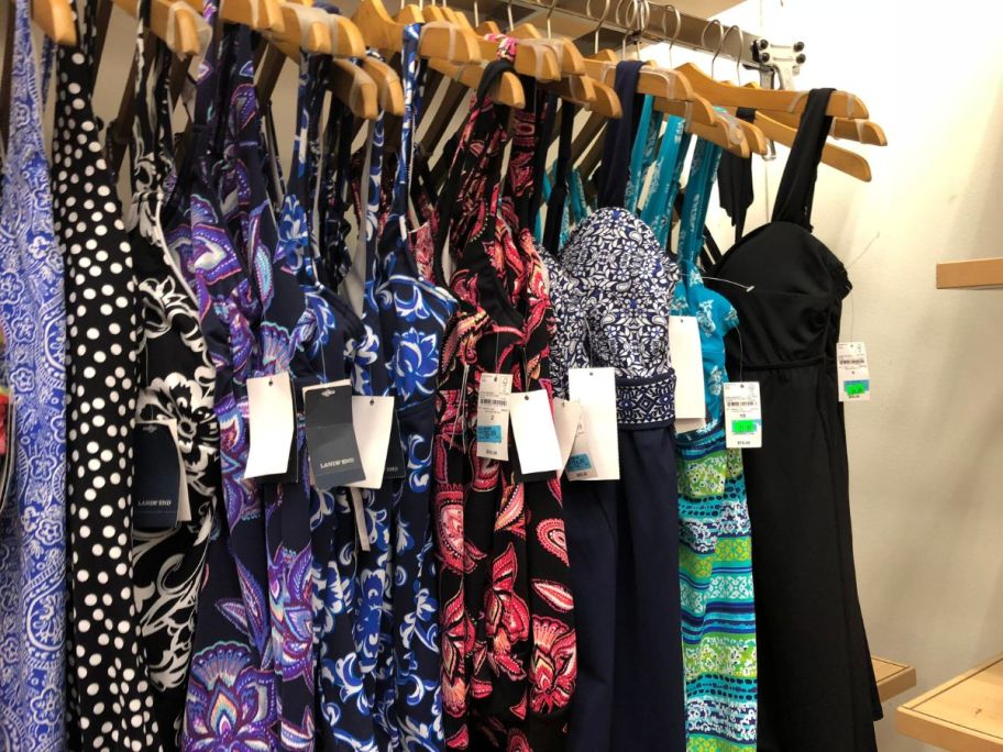 lands end women's swimwear hanging on rack in store