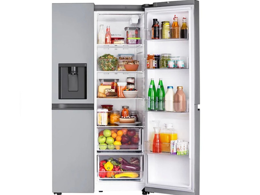 silver side by side refrigerator open with food inside