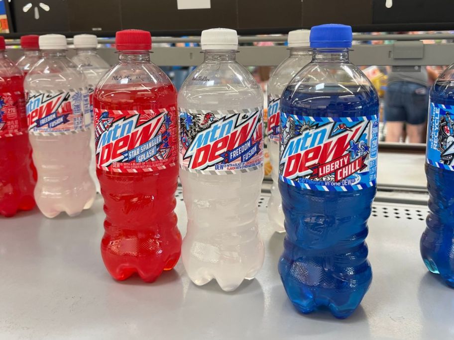 mountain dew red, white, and blue bottles on store shelf