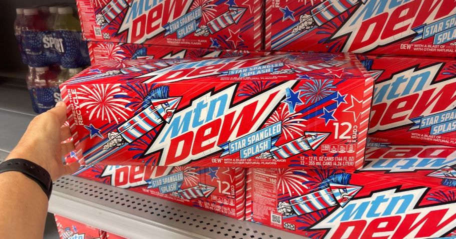 hand grabbing mountain dew st spangled bash 12-pack can case off off store shelf
