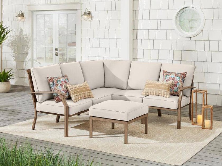 patio seatiing set displayed on a rug and cushions