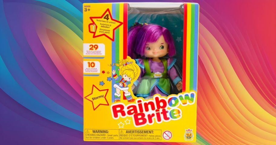 rainbow brite doll in box against rainbow background