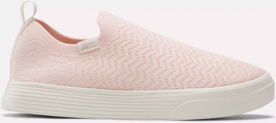 pink and white reebok slip on shoe