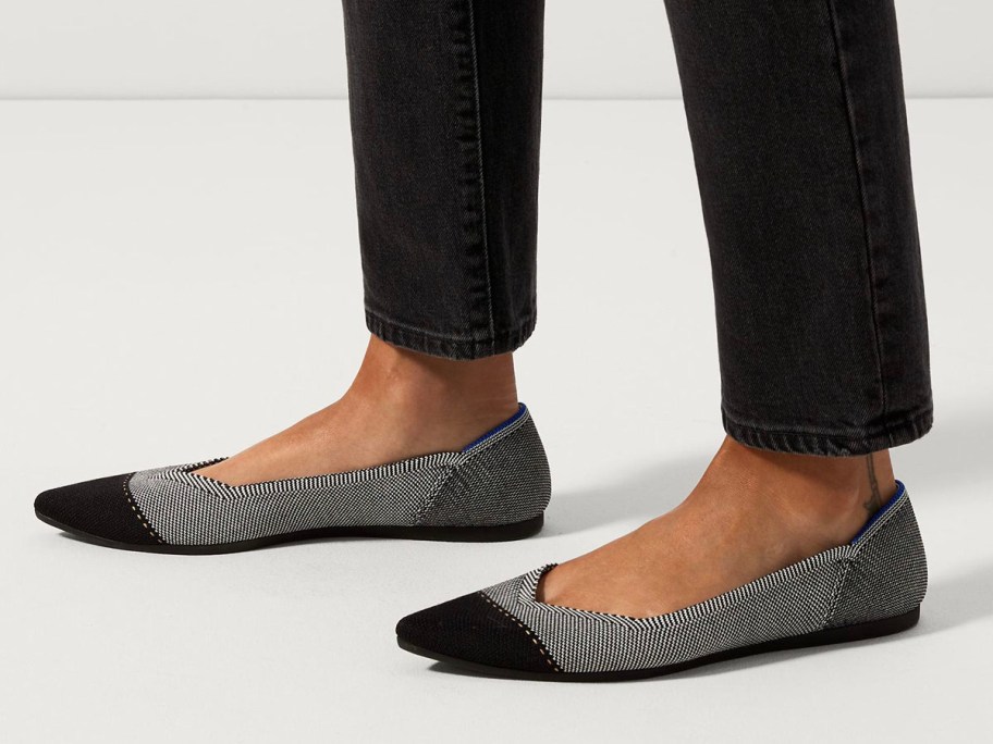 gray and black flat shoes with jeans