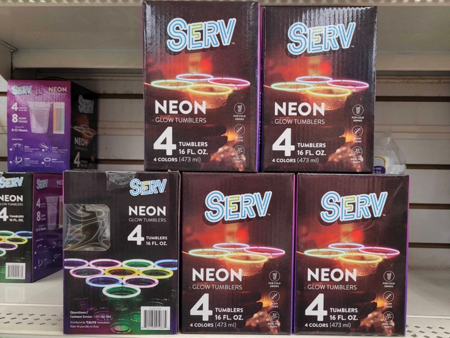 5 serv neon tumbler boxes stacked on shelf in store