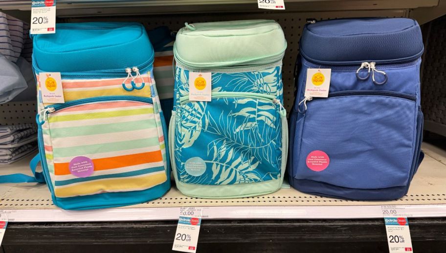 three sun squad 20 can backpack coolers on a store shelf