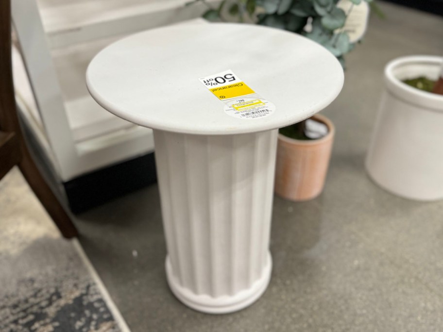 white planter table in store