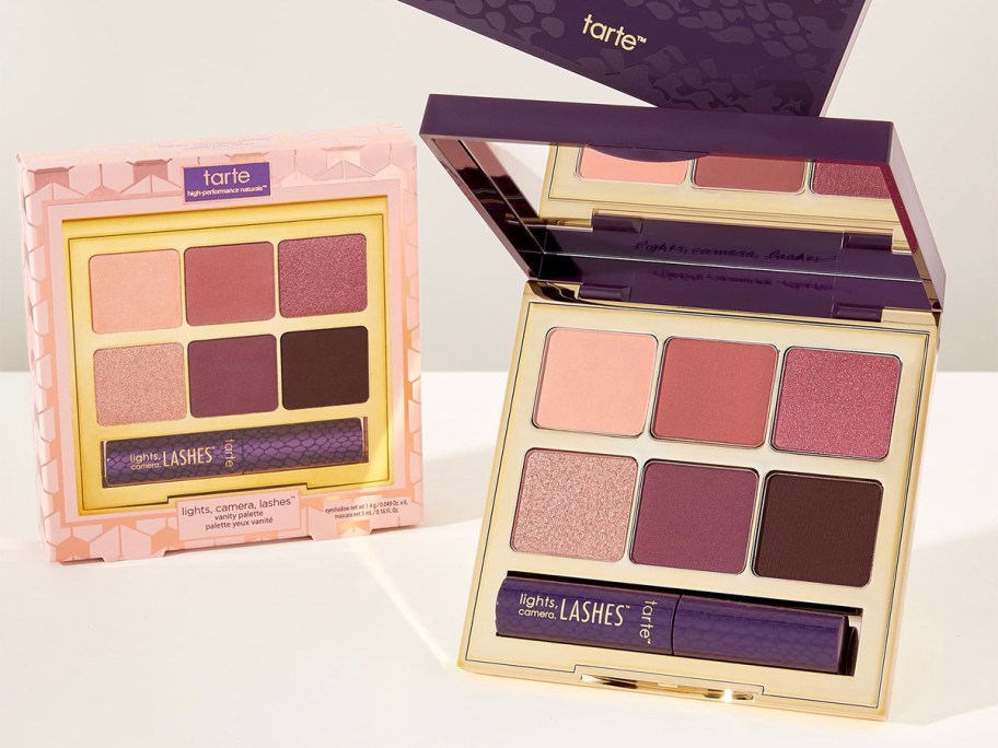 purple and gold eye shadow palette with mascara open next to box