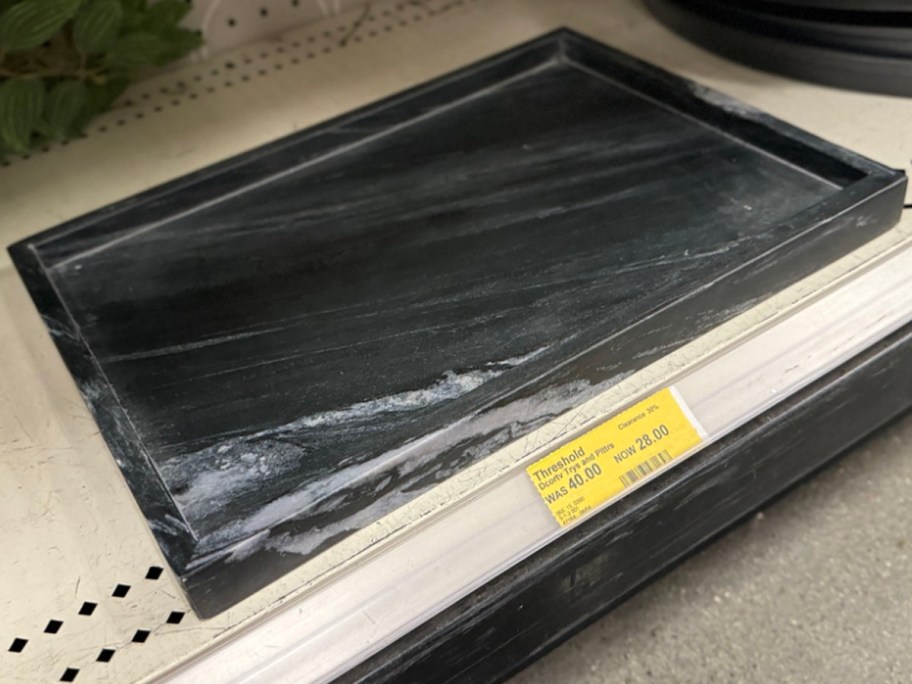 black tray on shelf 