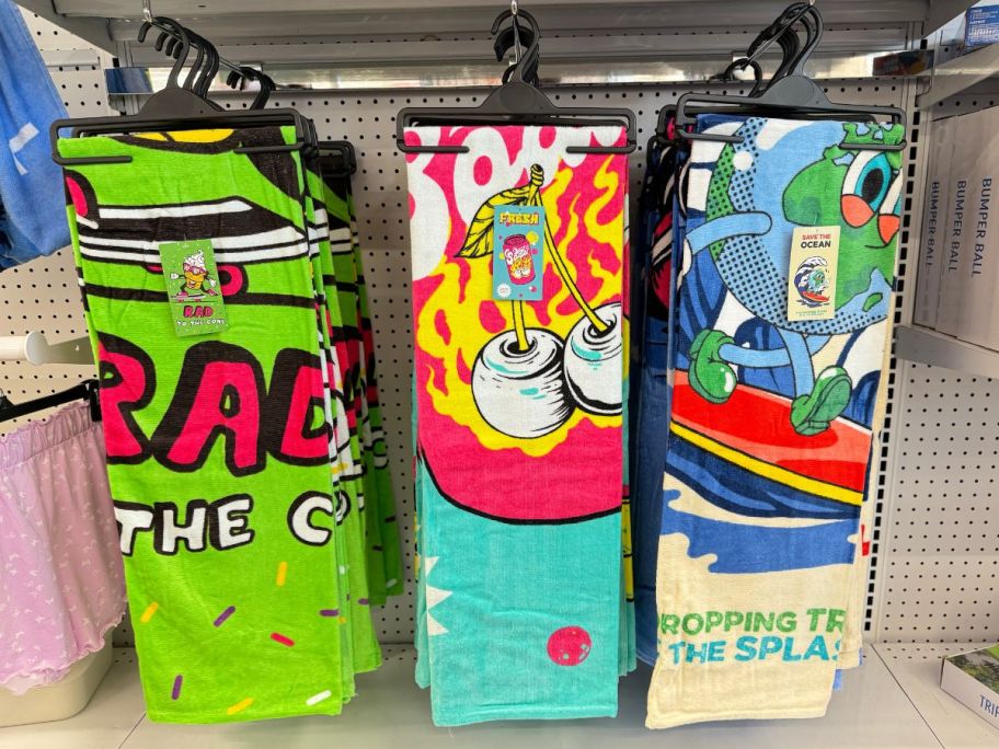 beach towels hanging in store