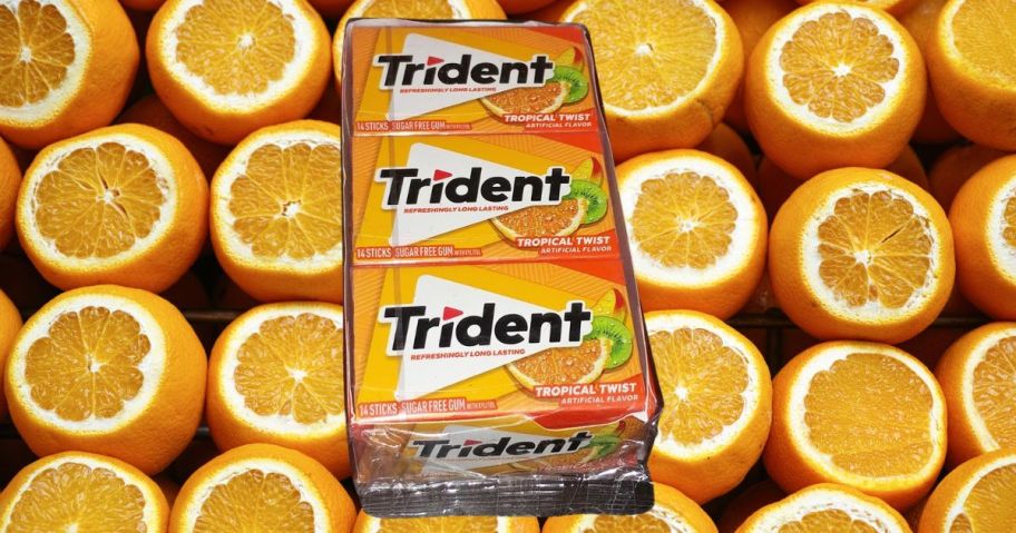 trident gum against background with oranges