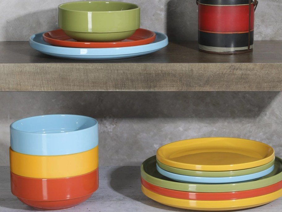 colorful stackable dinnerware set on a kitchen counter and shelf