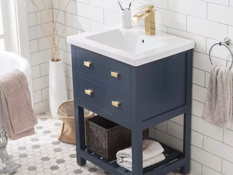 dark blue white top vanity in bathroom 