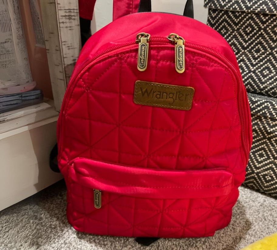 a red wrangler mini backpack purse 