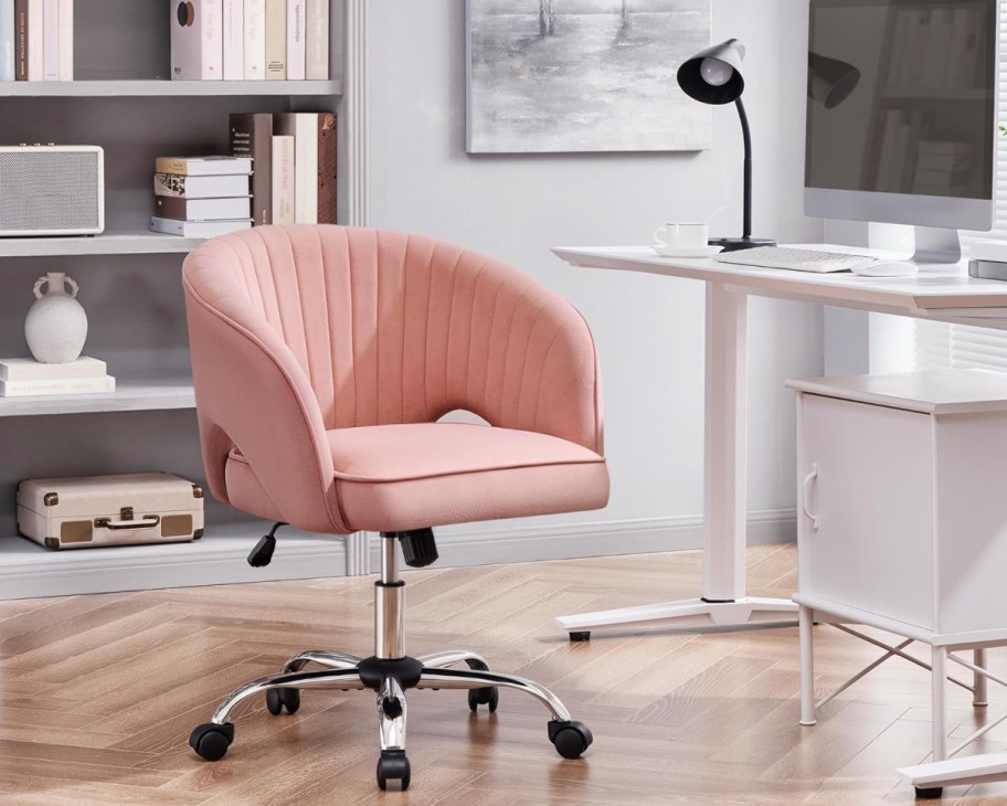 pink barrel back office chair next to desk