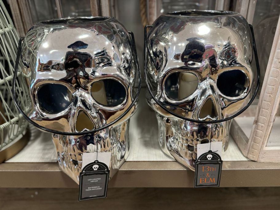 2 silver LED skulls on a store shelf