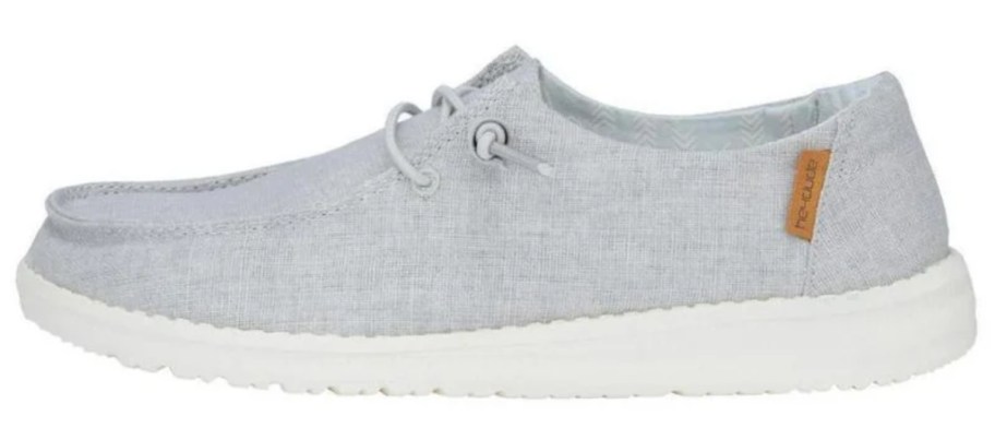 grey and white women's HEYDUDE shoe