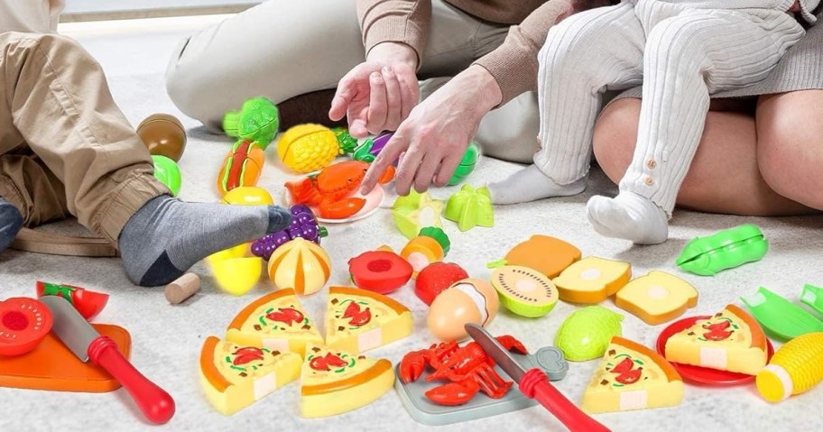 family playing with the 67-Piece Play Food Set