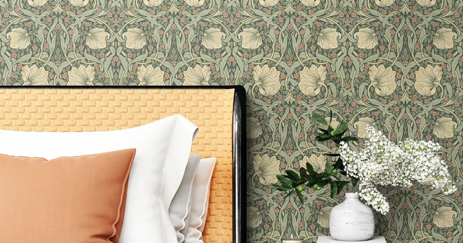 green floral print wallpaper in bedroom
