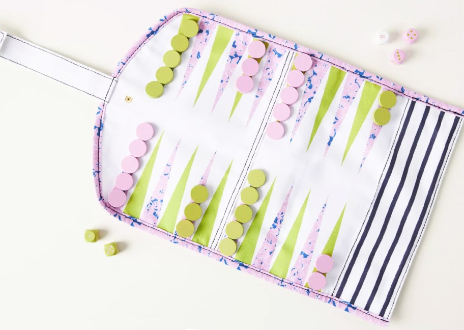 pink and green roll-up backgammon set