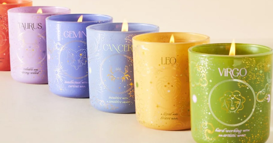 colorful zodiac candles in a row