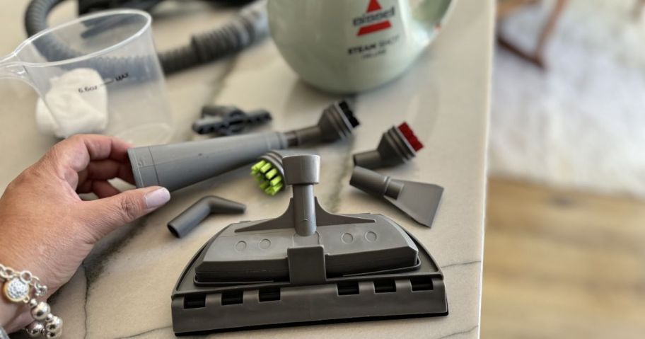 BISSELL Steam Shot OmniReach and Steam Shot Omni Steam Cleaners attachments on counter