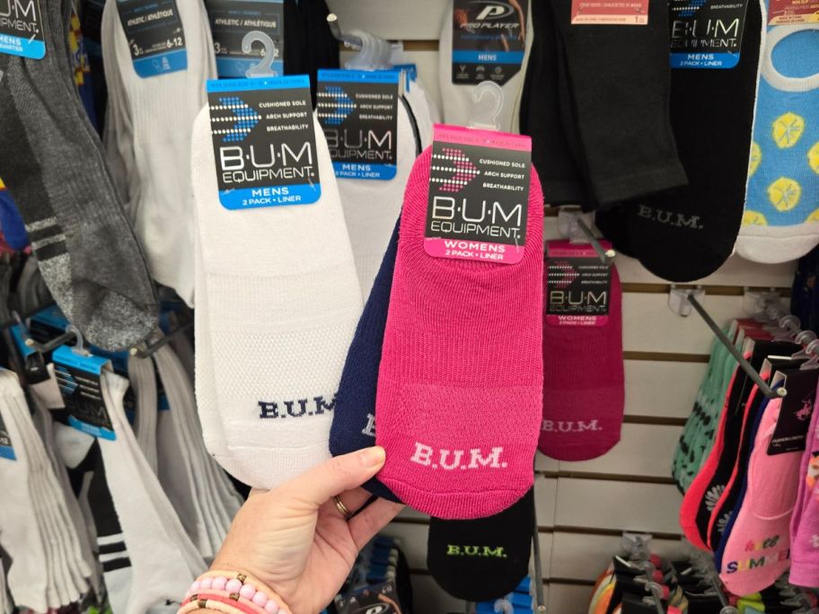 BUM Equipment Men's & Women's Liner Socks hanging in store