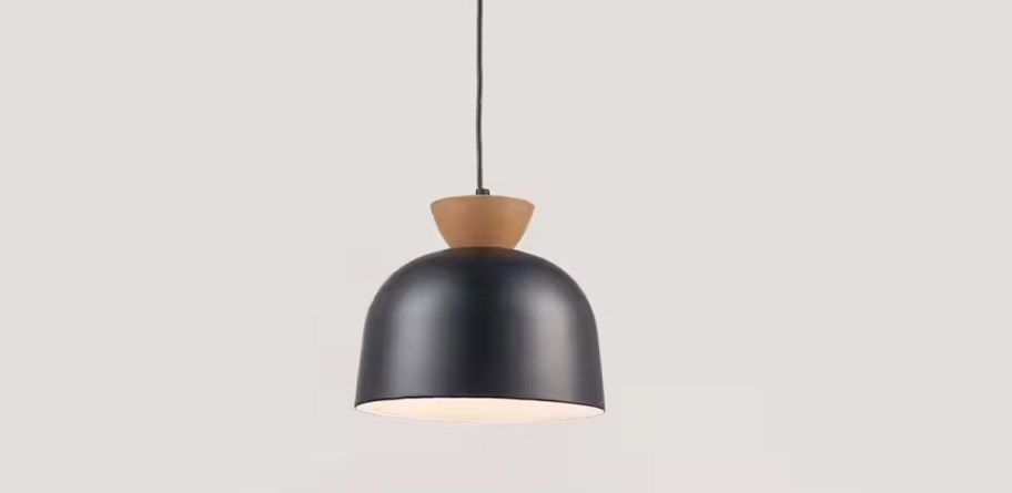 pendent light fixture with black metal shade