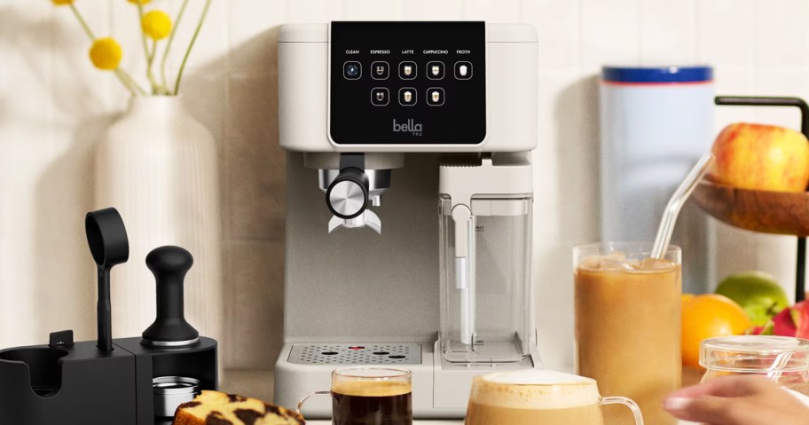 white and black espresso machine on counter with drinks