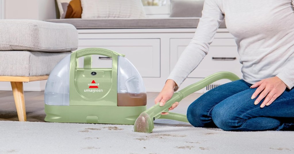 woman cleaning carpet with Bissell Little Green