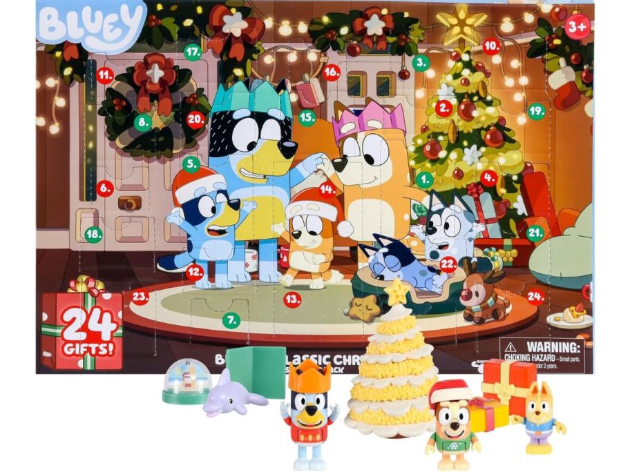 Stock image of a Bluey Advent calendar with some of the figurines from inside set in front of it