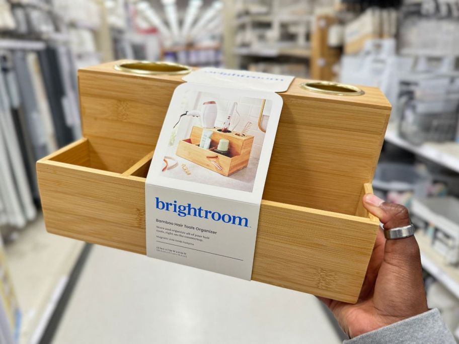 Brightroom 12" x 7" x 6" Bamboo Hair Tools Organizer w/ 5-Piece Magnets being held by hand in store